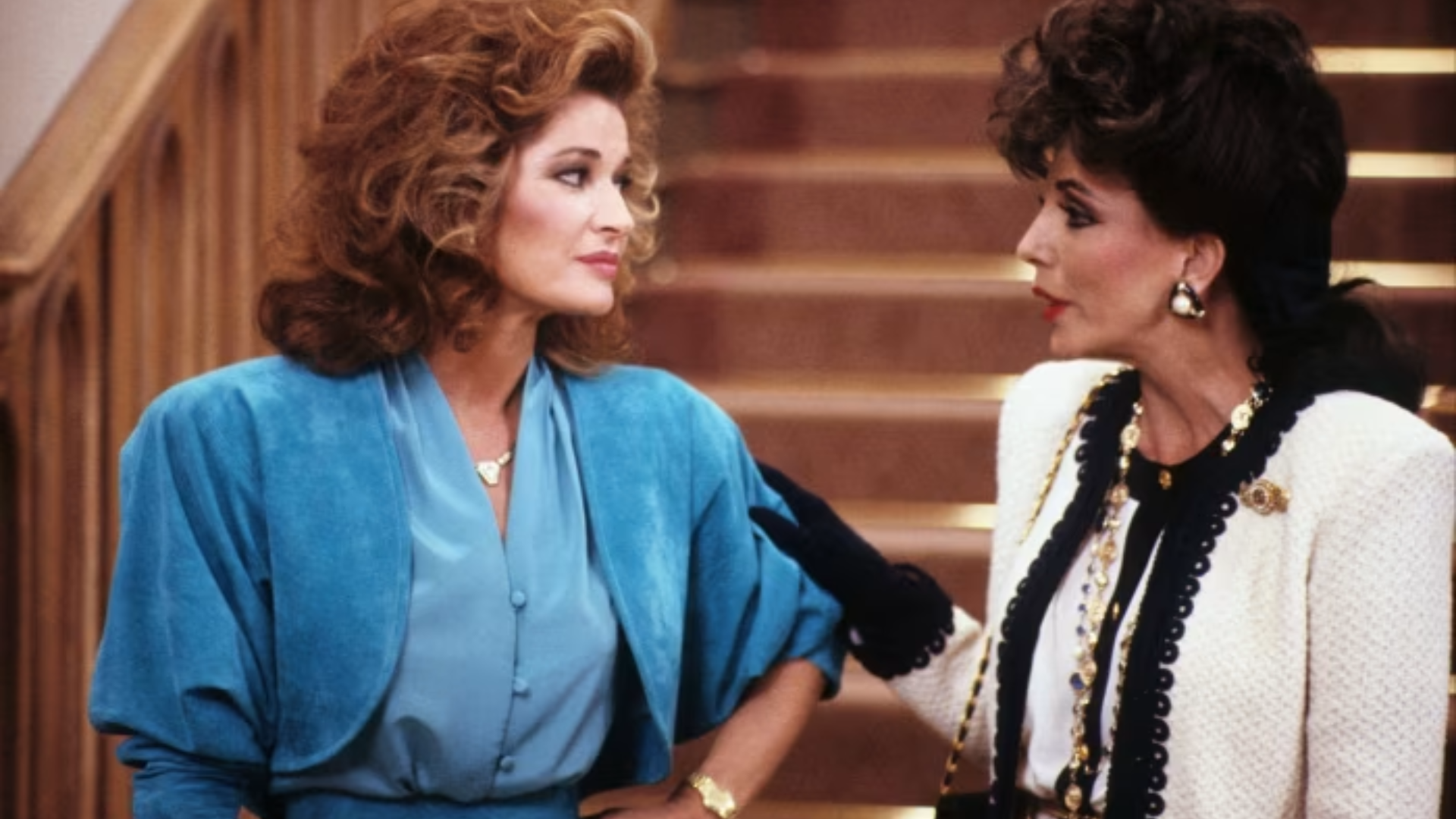 1980s fashion with exaggerated shoulder pads